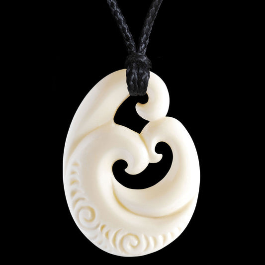 Family Koru with carved patterning, hand crafted bone pendant-0